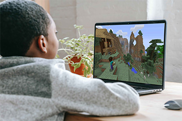 Young Boy Playing Minecraft