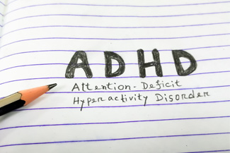 ADHD written on paper