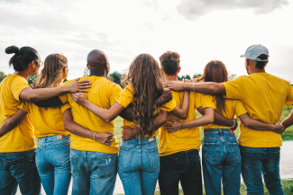 Teens supporting each other facing away