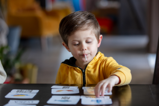 Boy learning objects