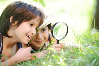 Kids with Neurodiversity playing in grass
